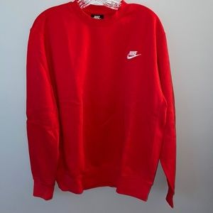 Red Nike crewneck.